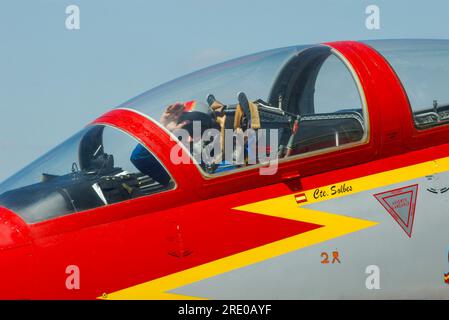 Pilot in CASA C-101 Aviojet jet plane of the Spanish Air Force Patrulla Aguila Display Team taxiing at the Royal International Air Tattoo airshow, UK Stock Photo