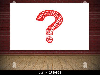 poster with question mark hanging on red brick wall Stock Photo