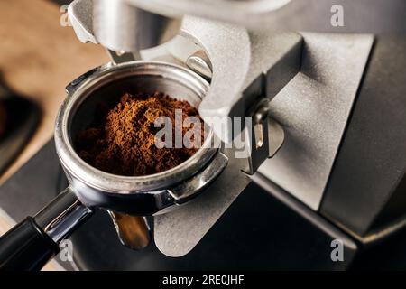 https://l450v.alamy.com/450v/2re0jhf/preparation-of-coffee-close-up-of-grinded-coffee-beans-in-portafilter-coffee-machine-arabica-2re0jhf.jpg