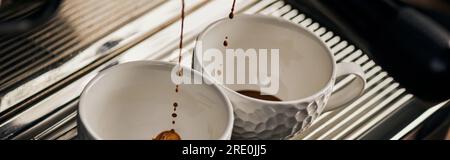 black coffee, extraction, fresh espresso dripping into cup, professional  coffee machine Stock Photo by LightFieldStudios