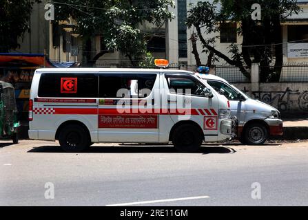 July 24, 2023, Chittagong, Chittagong Medical College Hospi, Bangladesh: July 24, 2023. Chittagong, Bangladesh : A line of private ambulances parked in front of the Chittagong Medical College Hospital in Bangladesh.Bangladesh Ambulance Malik Kalyan Samiti has announced the suspension of ambulance movement across the country for an indefinite period to realize 6-point demands including making toll free and formulating policies for ambulance movement on all roads and bridges of the country.The organization said that the movement of ambulances will be stopped across the country from 12 Stock Photo