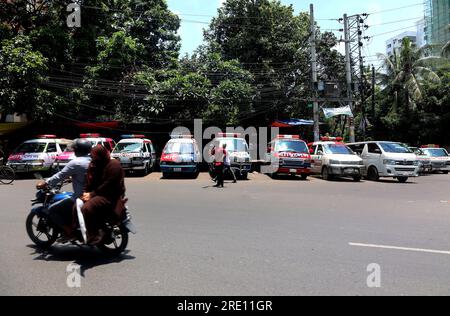 July 24, 2023, Chittagong, Chittagong Medical College Hospi, Bangladesh: July 24, 2023. Chittagong, Bangladesh : A line of private ambulances parked in front of the Chittagong Medical College Hospital in Bangladesh.Bangladesh Ambulance Malik Kalyan Samiti has announced the suspension of ambulance movement across the country for an indefinite period to realize 6-point demands including making toll free and formulating policies for ambulance movement on all roads and bridges of the country.The organization said that the movement of ambulances will be stopped across the country from 12 o'cl Stock Photo