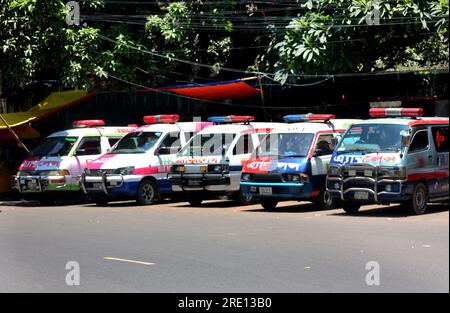 July 24, 2023, Chittagong, Chittagong Medical College Hospi, Bangladesh: July 24, 2023. Chittagong, Bangladesh : A line of private ambulances parked in front of the Chittagong Medical College Hospital in Bangladesh..........Bangladesh Ambulance Malik Kalyan Samiti has announced the suspension of ambulance movement across the country for an indefinite period to realize 6-point demands including making toll free and formulating policies for ambulance movement on all roads and bridges of the country..........The organization said that the movement of ambulances will be stopped across the country Stock Photo