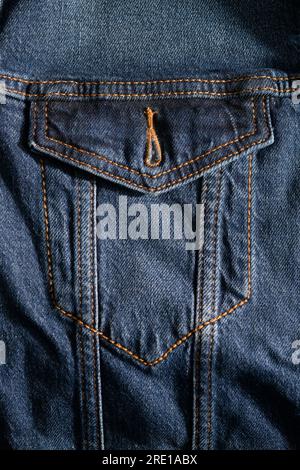 Close up of Denim Jacket Button Loop and Pocket Stock Photo