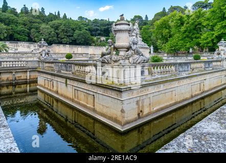 Jardins de la Fontaine (fountain gardens) are a lavish series of connected pools - originally the source of water in Nimes in the South of France. Stock Photo