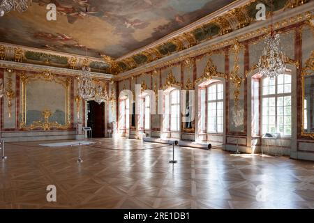 Rundāle Palace interior and details. Richly decorated Gold Hall with beautifully painted ceiling, used as the Duke’s throne room Stock Photo