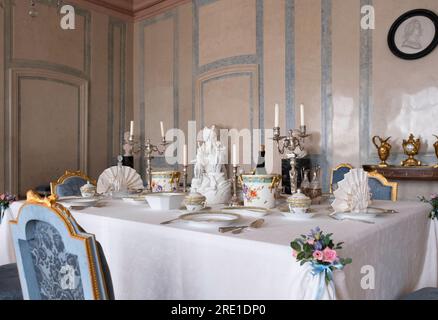 Rundāle Palace interior, dining room. The dining table is set Stock Photo