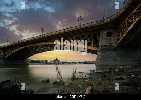 under Margaret Bridge, on the banks of the Danube, overlooking the Parliament, Budapest Hungary Stock Photo