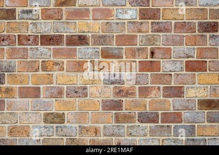 Background from a brick wall in various shades of red and brown Stock Photo