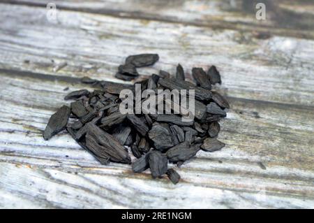 Saudi Oud incense, an aromatic biotic material that releases fragrant smoke when burnt. The term is used for either the material or the aroma, compose Stock Photo