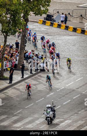 Paris, France. 23rd July, 2023. Cyclists peloton are seen passing on the Champs Elysées, Arrived at the Champs Elysées in Paris on the 21st and final stage of the Tour de France, with a massive turnout of Danish fans to celebrate the victory of Jonas Vingegaard of the Jumbo-Visma team. In the final sprint, the Belgian Jordi Meeus outsprinted Jasper Philipsen and won the final stage. Credit: SOPA Images Limited/Alamy Live News Stock Photo