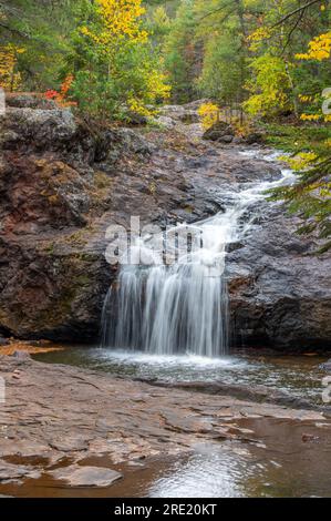 The various river features of the Amnicon River as it flows through Amnicon Falls State Park in Wisconsin. Stock Photo