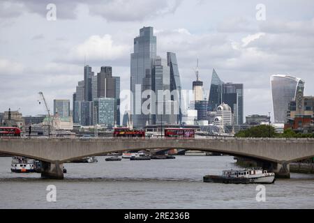 View looking towards Waterloo Bridge with the City of London, financial district in the distance from Hungerford Bridge, central London, England, UK Stock Photo