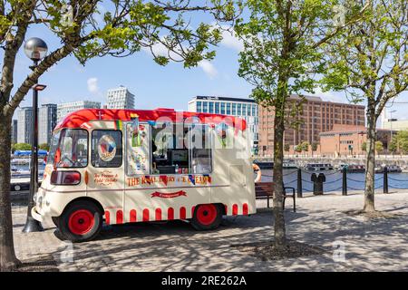 Liverpool, united kingdom May, 16, 2023 Ice cream van in Liverpool offering street food in Albert Dock with tables Stock Photo