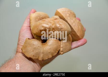 Edible bulb of the plant (Dioscorea bulbifera) originally from Africa and known as 'cará moela' Stock Photo