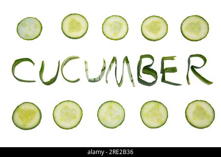 Cucumber word written with cucumber peel on white isolated background surrounded by slices Stock Photo