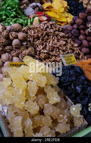 Kazakhstan, Almaty. Dried Fruits, Walnuts, and Crystalized Sugar  in the Green Bazaar. Stock Photo