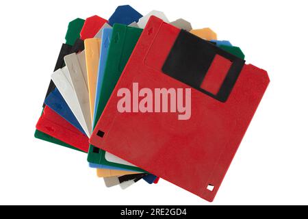 Colored old retro floppy diskettes in stack. Isolated on white background. Stock Photo