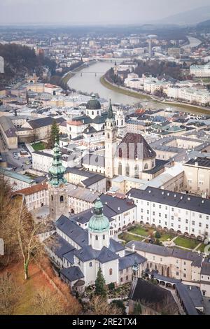 Salzburg historic city centre with ancient churches. Saint Peter's Abbey(foreground), Franciscan Church and Collegiate Church. Salzburg, Austria Stock Photo