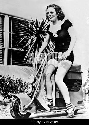 https://l450v.alamy.com/450v/2re2yr5/hollywood-california-c-1937-actress-dorothy-short-riding-her-new-motor-glide-scooter-around-the-movie-lots-2re2yr5.jpg
