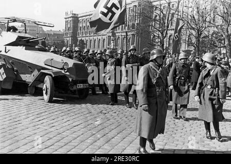 Vienna, Austria:  March 13, 1938 A German Panzer and troops in the streeets of Vienna. Stock Photo