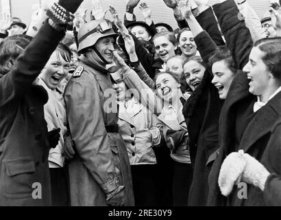 Vienna, Austria:  March 13, 1938 The driver of a  German Panzerspahwagen gets a warm reception from the citizens of Austria. Stock Photo
