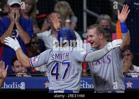 Texas Rangers' Josh Smith (47) is congratulated by Josh Jung after