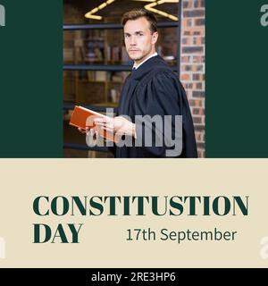 Constitution day text in green on beige and green with caucasian male attorney in gown with book Stock Photo