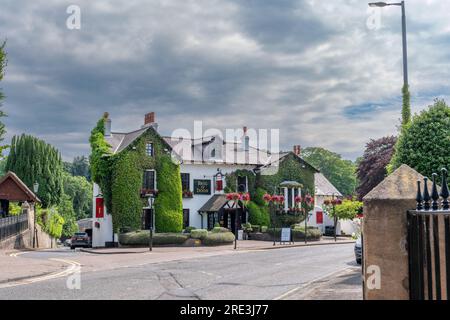 Alloway, Scotland, UK - April 09, 2019: High Maybole Rd, Alloway, Ayr and the famous Brig O’ Doon Hotel front entrance looking along Maybole Road Stock Photo