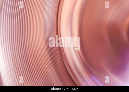 Abstract spinning pink light trails background Stock Photo