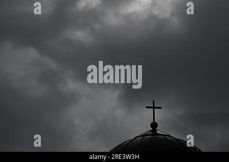 Stuttgart, Germany. 25th July, 2023. Dark rain clouds move over the grave chapel at Württemberg. According to the forecast, the weather will remain rainy and stormy in the coming days. Credit: Bernd Weißbrod/dpa/Alamy Live News Stock Photo