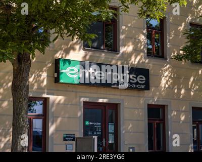 Enterprise car rental agency logo sign on a building exterior. Entrance of the American car and van hire company. Stock Photo