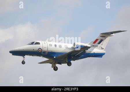 Fairford, UK. 12th July, 2023. RAF Embraer Phenom 100 ZM335 arrives for RIAT 2023 Air Show. Stock Photo