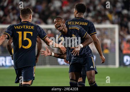 Real Madrid defender David Alaba (4) celebrates with midfielder Federico Valverde (15) after he scored a goal during the Soccer Champions Tour against Stock Photo