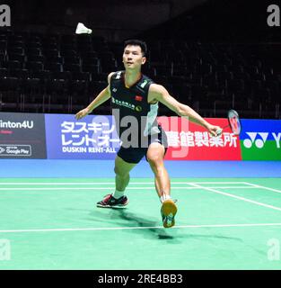 Tokyo, Japan. 25th July, 2023. Zhao Jun Peng of China competes during the men's singles first round match against Lee Cheuk Yiu of China's Hong Kong at the Japan Open Badminton Championships 2023 in Tokyo, Japan, July 25, 2023. Credit: Yang Guang/Xinhua/Alamy Live News Stock Photo
