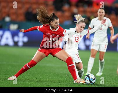 Hamilton, New Zealand. 25th July, 2023. Seraina Piubel (L) of Switzerland vies with Thea Bjelde of Norway during the Group A match at the 2023 FIFA Women's World Cup in Hamilton, New Zealand, July 25, 2023. Credit: Qin Lang/Xinhua/Alamy Live News Stock Photo