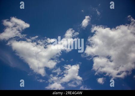 White clouds in the blue sky. Stock Photo