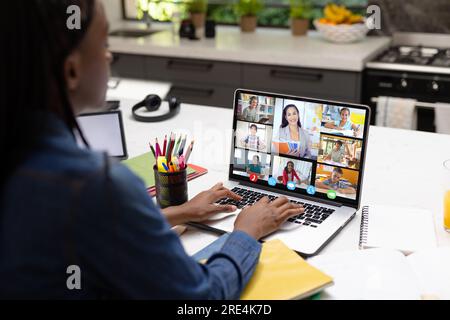 African american female teacher having a video conference with female teacher and diverse students Stock Photo