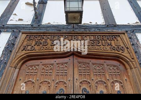 Northwich library, doorway and entrance, Brunner public Library and salt museum AD 1909 in dark wood, Witton St, Northwich, Cheshire, CW9 5DR Stock Photo
