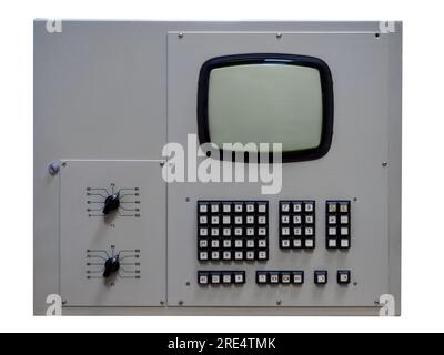 CRT kinescope with buttons and switches. Obsolete tube kinescope of Soviet equipment. First computer technology. Isolated on white background. Stock Photo