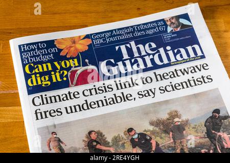 25 July 2023. Headline on Guardian newspaper reads Climate crisis link to heatwave fires undeniable, say scientists. Stock Photo