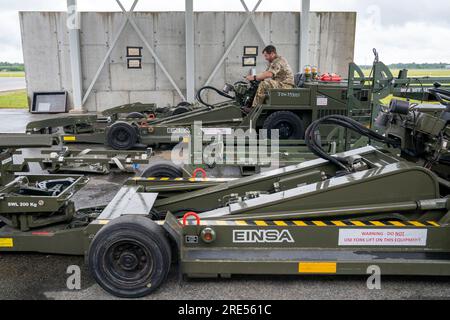Ground engineer Sergeant Matt Cozens, who is part of the Royal Air Force  (RAF)140 Expeditionary Air Wing, based at the Amari Airbase, in Estonia,  inspects the VAP60 weapon loaders, used to arm
