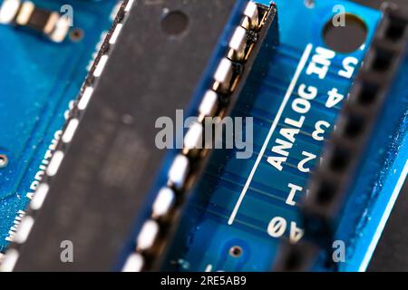 Micro controller close-up, ANALOG IN Input pin detail. Open source microcontroller for DIY projects. Stem activities with electronics background Stock Photo