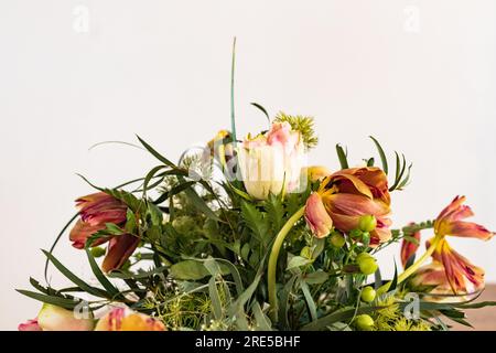 Rotten flowers bouquet, and aging treatment concept. Decay of flower decoration, from fresh to withered flowers Stock Photo