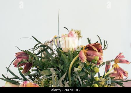 Rotten flowers bouquet, and aging treatment concept. Decay of flower decoration, from fresh to withered flowers Stock Photo