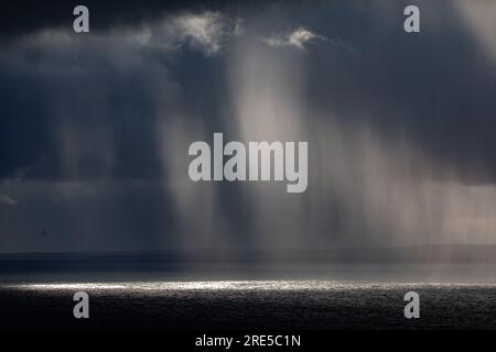 Incoming squall (rainstorm) on the sea between the Isle of Mull and Coll, Inner Hebrides, Scotland Stock Photo