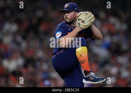 Houston Astros relief pitcher Parker Mushinski looks in at the