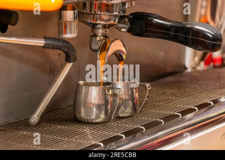 Coffee extraction from professional coffee machine Stock Photo