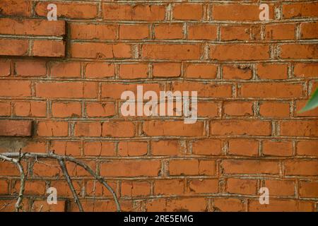 Red brick and brick edge from pillar in front of wall as texture background Stock Photo