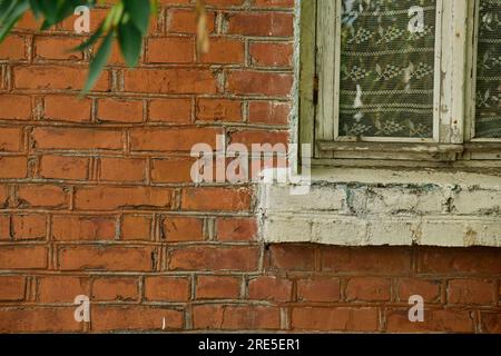 Red brick and brick edge from pillar in front of wall as texture background Stock Photo